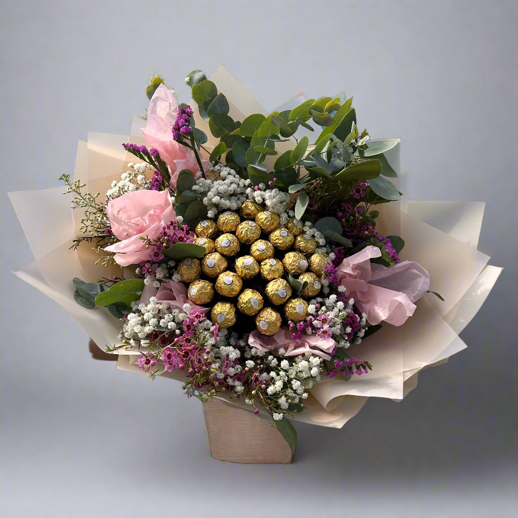Puokste-su-saldainiais-Ferrero-Rocher